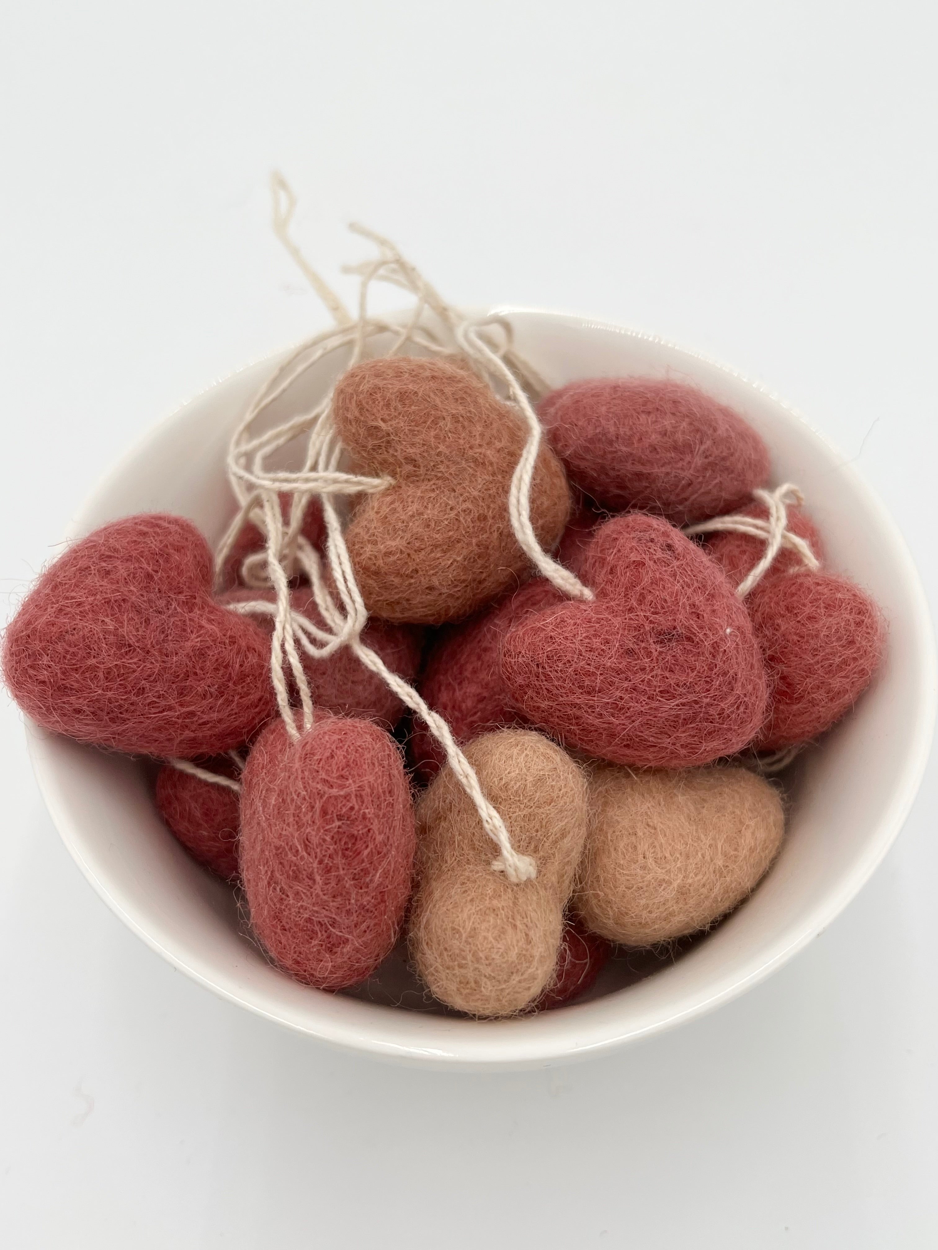 Mini felted hearts on a string